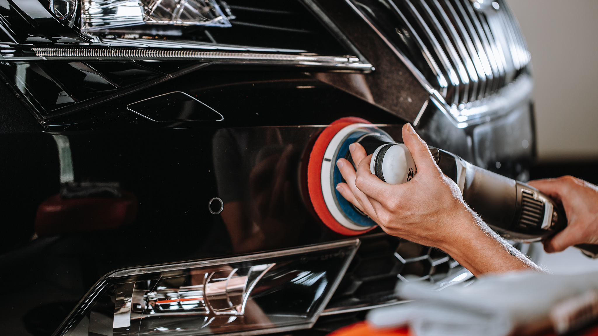 Professional detailing of a modern car, varnish polishing lacquer, cleaning car
